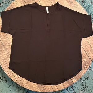 Perfect fall work to play blouse top in classic black.